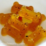 Gummy dog treats in white bowl