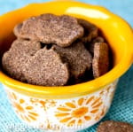 Peanut butter banana and coconut dog treats in yellow patterned bowl