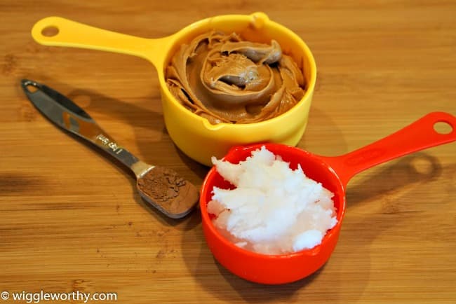 Ingredients needed to make peanut butter and carob frozen dog treats. Peanut butter, coconut oil, carob powder Ingredients needed to make peanut butter and carob frozen dog treats. Peanut butter, coconut oil, carob powder