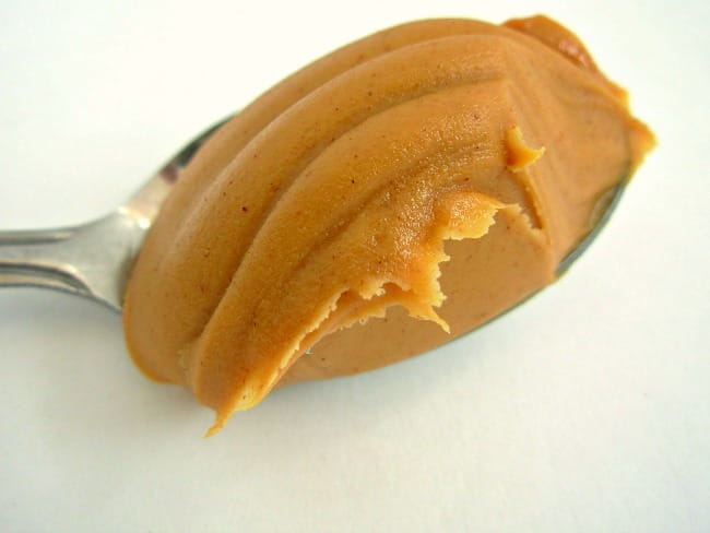 Creamy peanut butter on a spoon Creamy peanut butter on a spoon